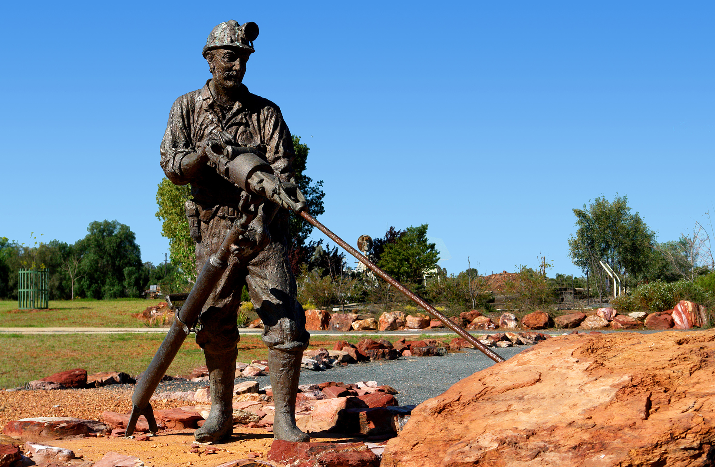 Bronze sculpture of a miner in Mining Heritage Park